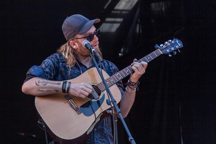 Soul Tonic lead instructor Dave Holmes playing guitar