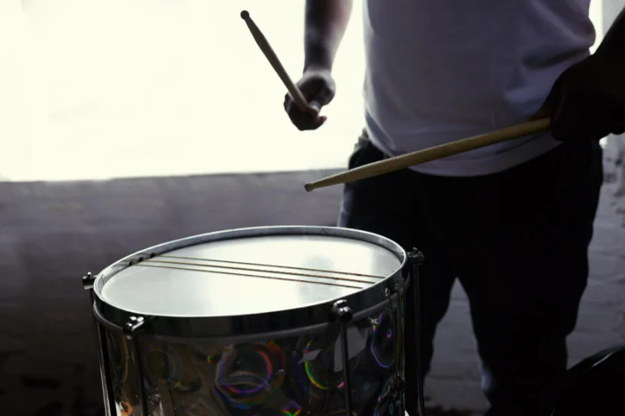 A man playing a samba drum