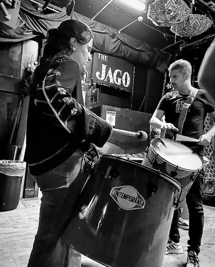 2 smaba workshop attendees playing percussion instruments